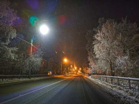 Deserted street of a night winter frosty small townの写真素材