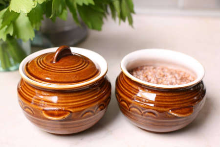 Two pots with boiled buckwheatの写真素材