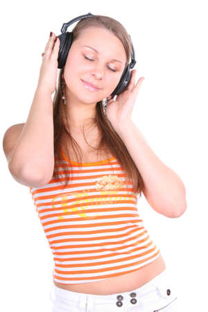 woman is listening to the music over white backgroundの写真素材