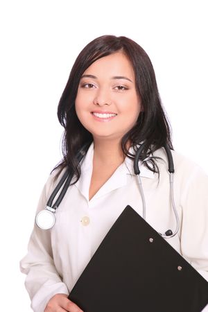 Smiling asian doctor holds a notebook over white backgroundの写真素材