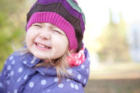 A cute little girl playing and having fun 