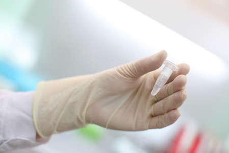 hand holding analysis in test tubeの写真素材