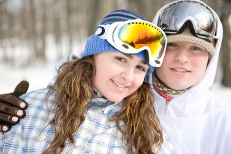 Happy couple of snowboardersの写真素材