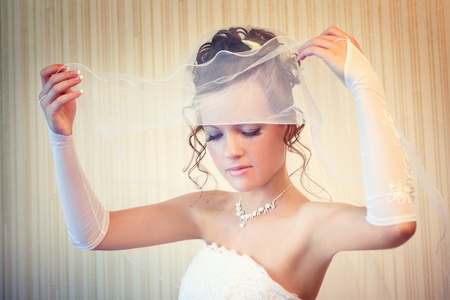 Attractive bride is opening her faceの写真素材