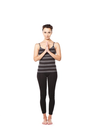 Asian woman is meditating. Yoga practice over white backgroundの写真素材