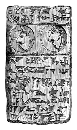 The image shows Assyrian clay. There are two circles in which two faces are present and around that design they are present and it is a structure similar to a wall, vintage line drawing or engraving illustration.のイラスト素材
