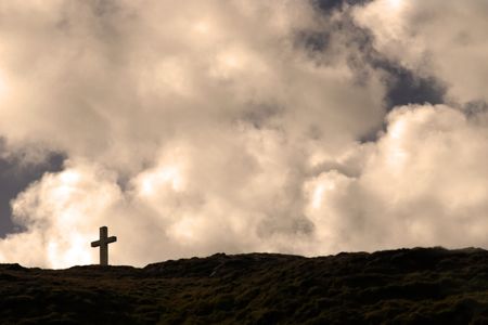 Cross on top of bear island in Irelandの写真素材
