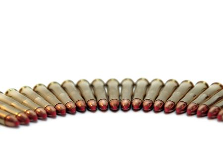 ammunition all in a row on a white backgroundの写真素材