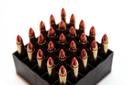 ammunition all organized in a box on a white backgroundの写真素材