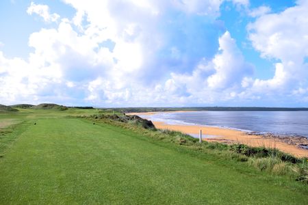 the edge of a links course in irelandの写真素材