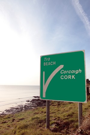 a beach road sign in county cork irelandの写真素材