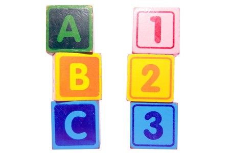 toy letter and number blocks against a white background that spell abc 123 