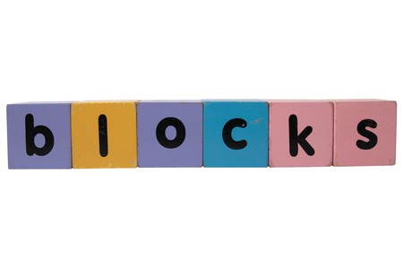 toy letters that spell blocks with white background の写真素材