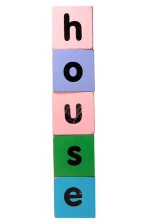 toy letters that spall house against a white background with clipping pathの写真素材