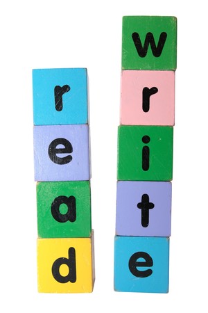 toy letters that spell read and write against a white background の写真素材