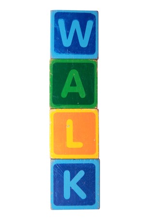 toy letters that spell walk against a white background の写真素材