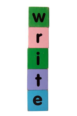 toy letters that spell write against a white backgroundの写真素材