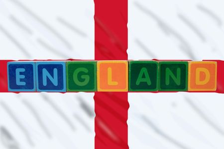 toy letters that spell england against a flag background の写真素材