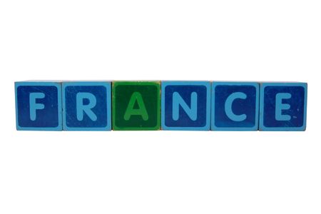 toy letters that spell france against a white background の写真素材