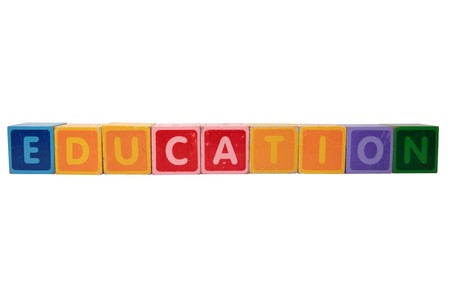 toy letters that spell education against a white backgroundの写真素材