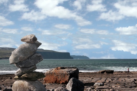 rock piles on the beach in doolin county clare irelandの写真素材