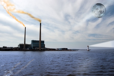 smoke rising from a power generating station with lighthouse beams and full moon at nightのeditorial素材