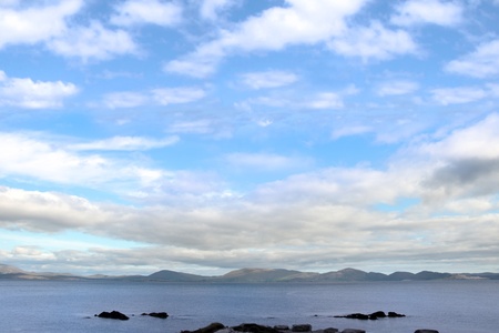kerry scenic view in ireland with mountains against a beautiful blue cloudy skyの写真素材