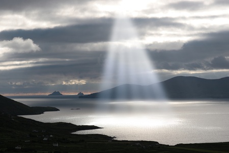 kerry scenic view of the Skellig rocks in ireland with mountains against a beautiful blue cloudy skyの写真素材
