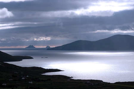 kerry scenic view of the Skellig rocks in ireland with mountains against a beautiful blue cloudy skyの写真素材