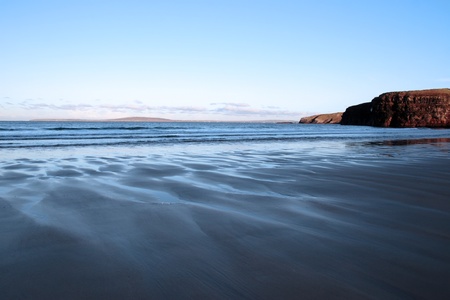 a view of the beach cliffs in ballybunion co kerry ireland on a cold winters dayの写真素材