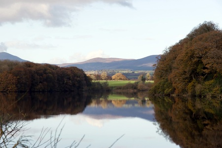knockmealdown mountains reflected on the calm river blackwater in county Waterford Irelandの写真素材