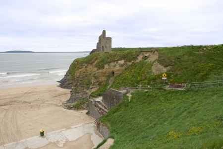 Ballybunion castle and steps to the beach at an Irish seaside resortの写真素材