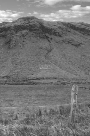 Sam for the hills written with rocks on mountains in county Donegal Ireland in black and whiteの写真素材