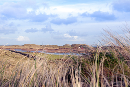 dunes that have suffered extreme coastal erosion damage due to big storm wavesの写真素材