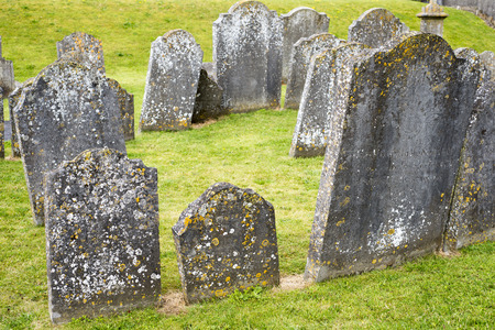 gravestones at ancient graveyard in St Canices Cathedral in kilkenny city irelandの写真素材