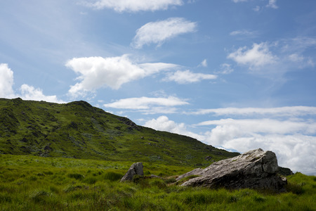 view from a beautiful hiking route the kerry way in ireland of rocky and green landscapeの写真素材