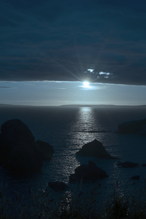 wild atlantic way sunset on the coastline of ballybunion county kerry ireland with wild grass in foregroundの写真素材