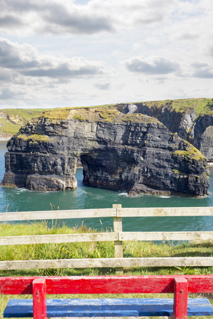 red and blue seat view of the virgin rock ballybunion on the wild atlantic wayの写真素材