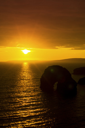 beautiful sunset over the virgin rock and ballybunion coast on the wild atlantic wayの写真素材
