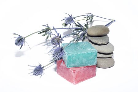 soaps off various shades with grey sone pebbles and lavenderの写真素材