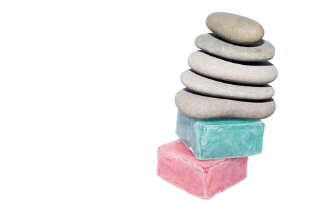 soaps off various shades with grey sone pebblesの写真素材