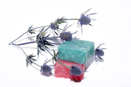 soaps off various shades with a beautiful lavender flowerの写真素材