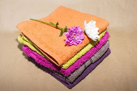 facecloths off various shades with flowersの写真素材