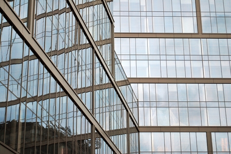 Skyscraper with glass facade. Modern building.