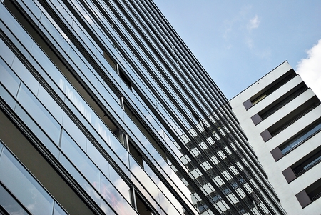 Modern office building with glass facade ofの写真素材