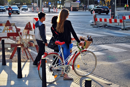 Warsaw, Poland. 16 September 2016. People crossing a street at a pedestrian crossing in Warsawのeditorial素材