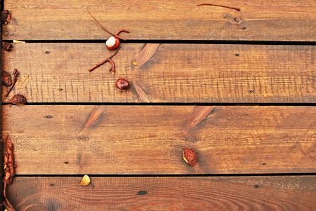autumn leaves on wooden backgroundの写真素材
