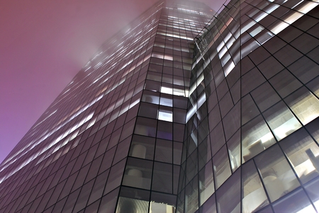 Modern building. Modern office building with facade of glassの写真素材