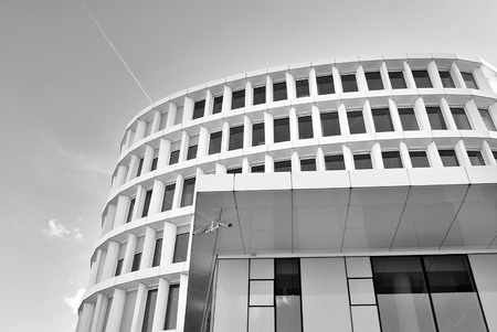 Modern office building with facade of glass. Black and whiteの写真素材