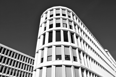 Modern office building with facade of glass. Black and whiteの写真素材